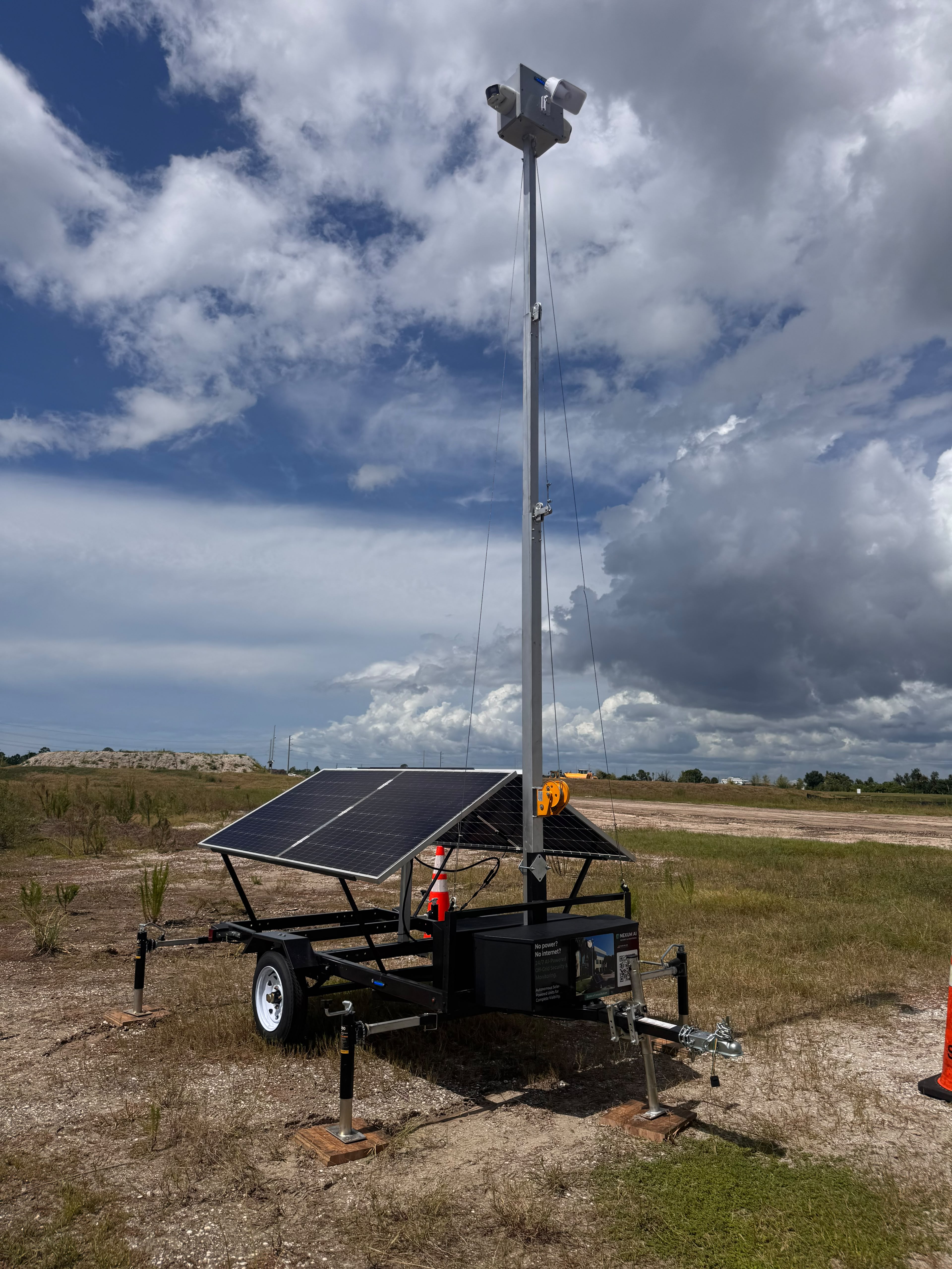 Nexum solar security trailer deployed in an open field
